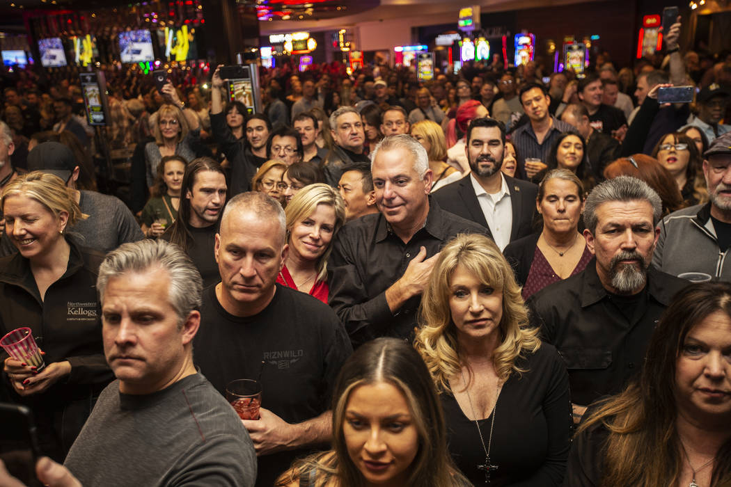 A large crowd gathers to listen to the All Request Live band during an event to say goodbye to ...