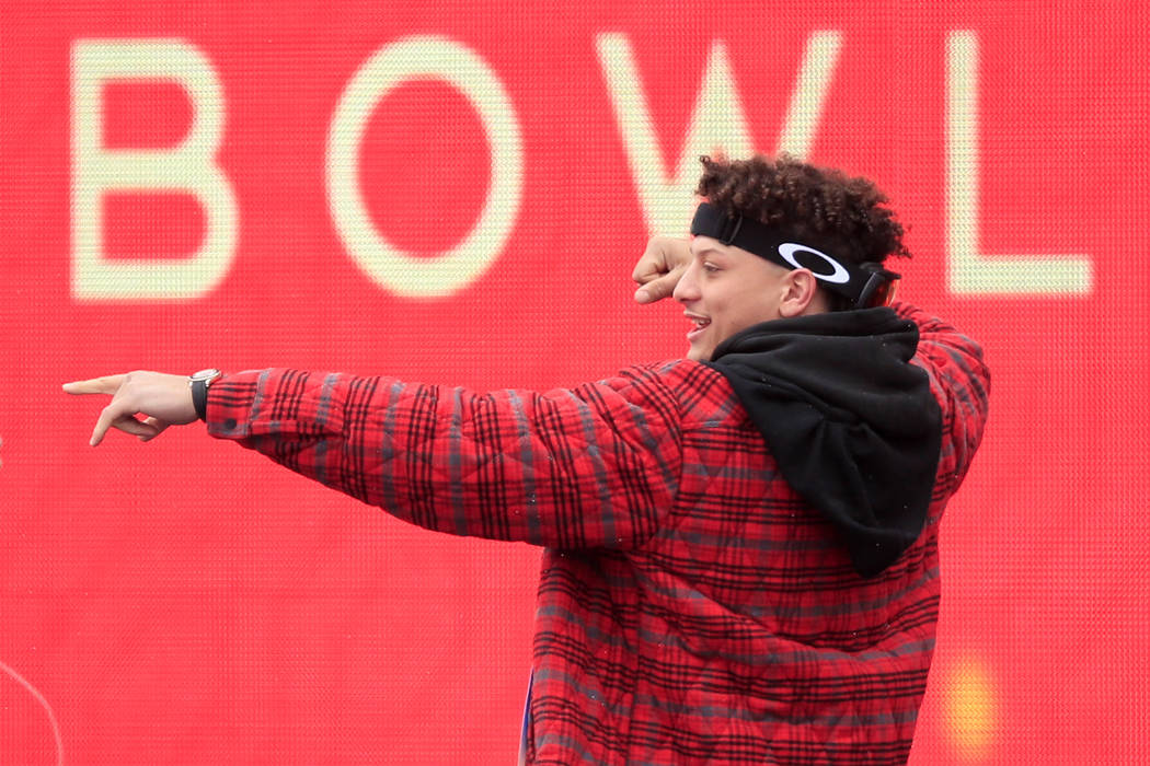 Kansas City Chiefs quarterback Patrick Mahomes celebrates during a Super Bowl parade and rally ...