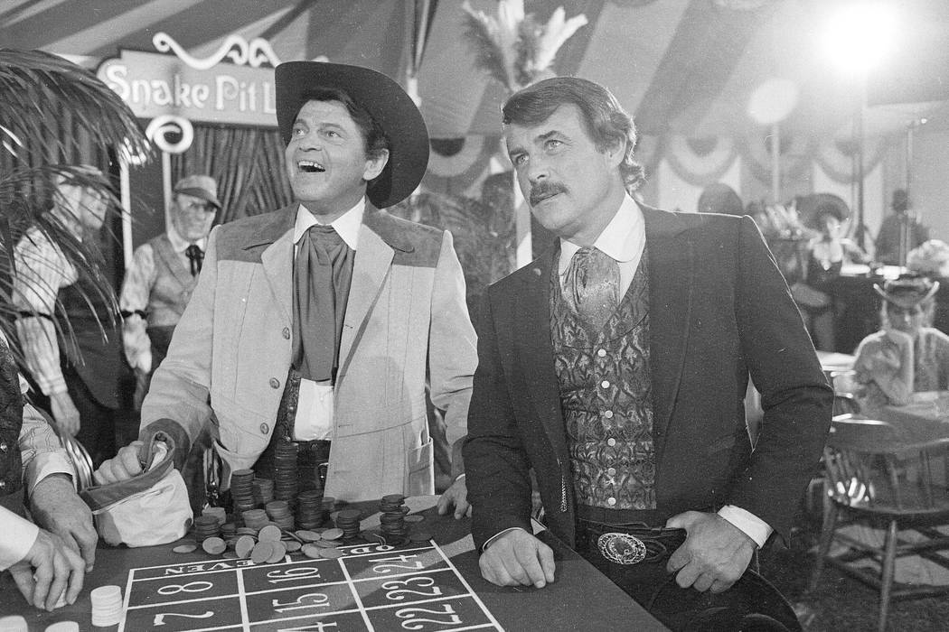 Actors Ross Martin, left, and Robert Conrad, right, are shown while filming a scene of the moti ...
