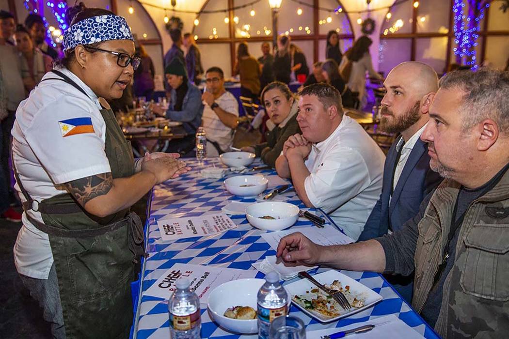 Chef Khaddy Dublin, left, Chef Battle San Diego winner, introduces her chicken afritada to the ...