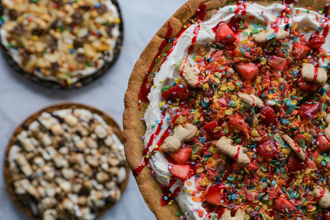 Fruity Pebbles (right) and other cooke pizzas at PizzaCake (PizzaCake)