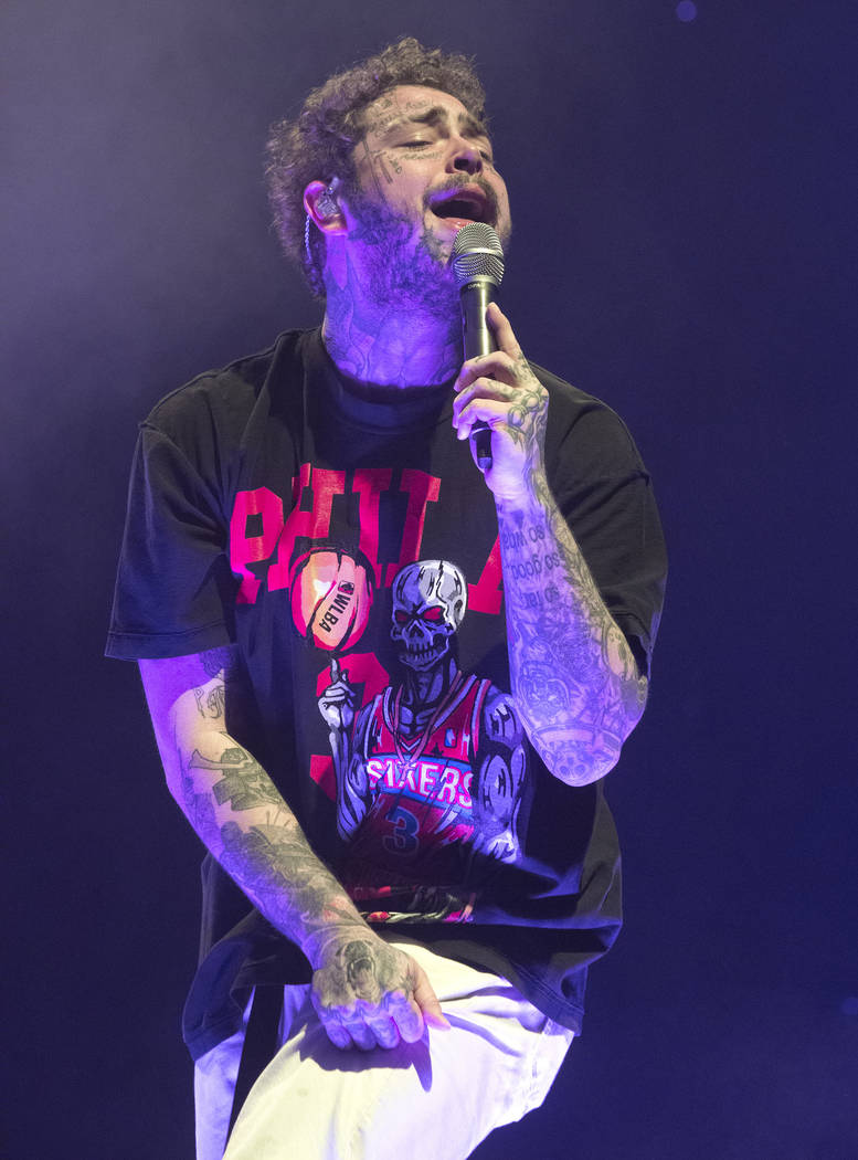 Post Malone performs in concert during his "Runaway Tour" at The Wells Fargo Center o ...