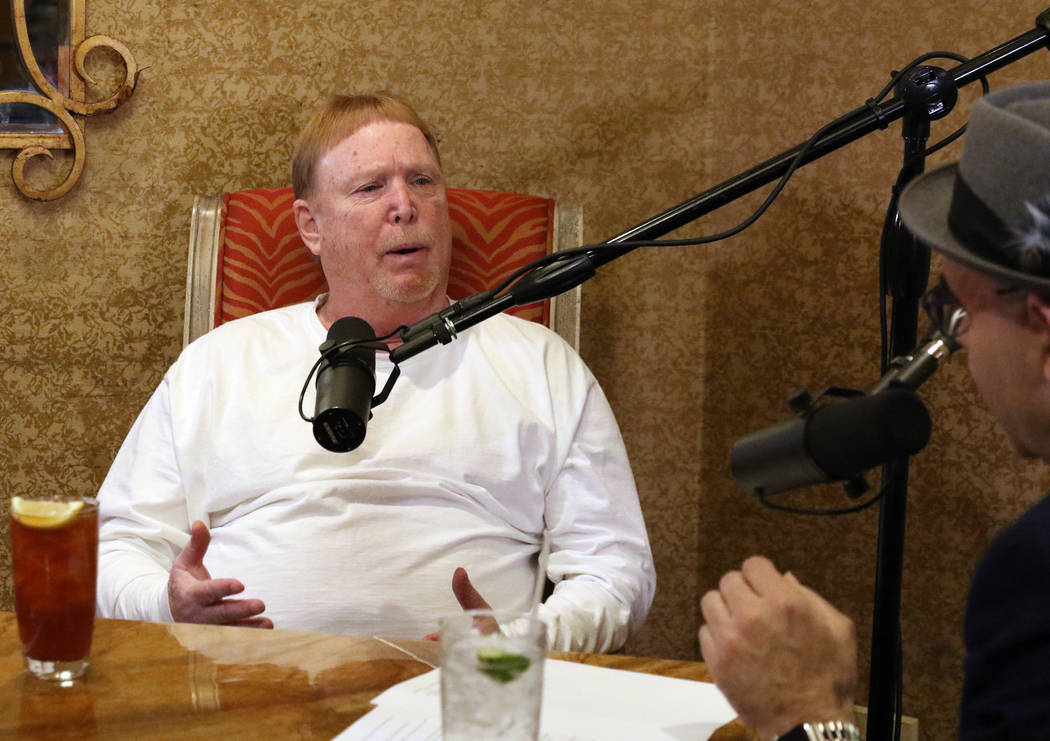 Las Vegas Raiders owner Mark Davis, left, speaks during his podcast with John Katsilometes on M ...
