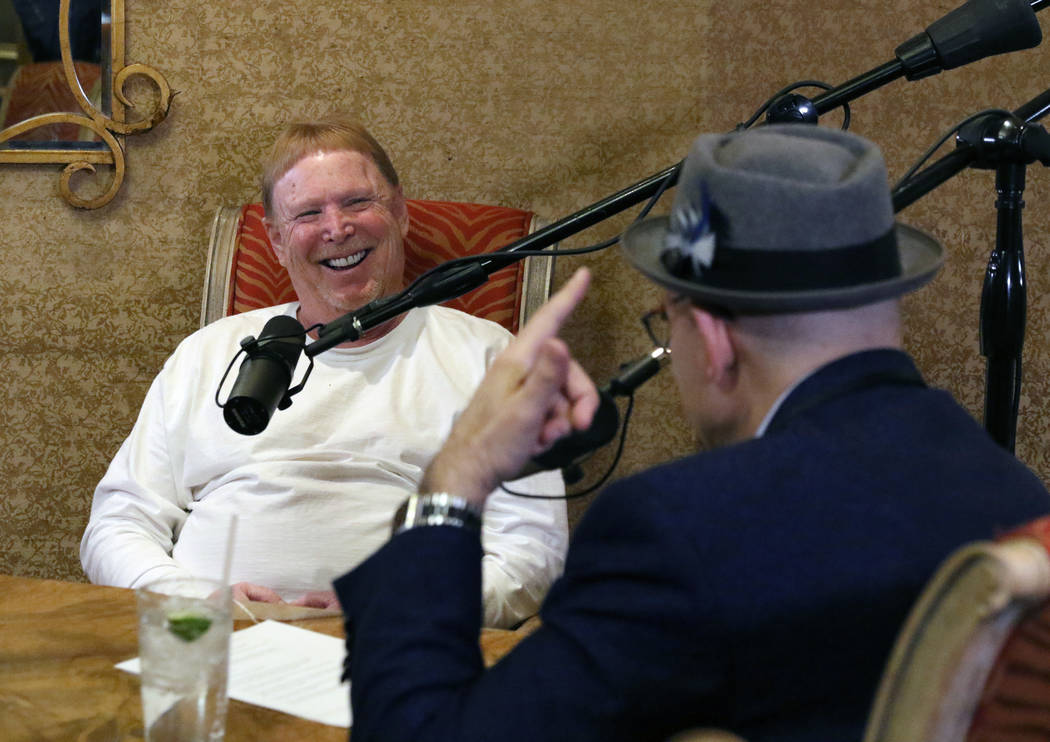 Las Vegas Raiders owner Mark Davis, left, speaks during his podcast with John Katsilometes on M ...