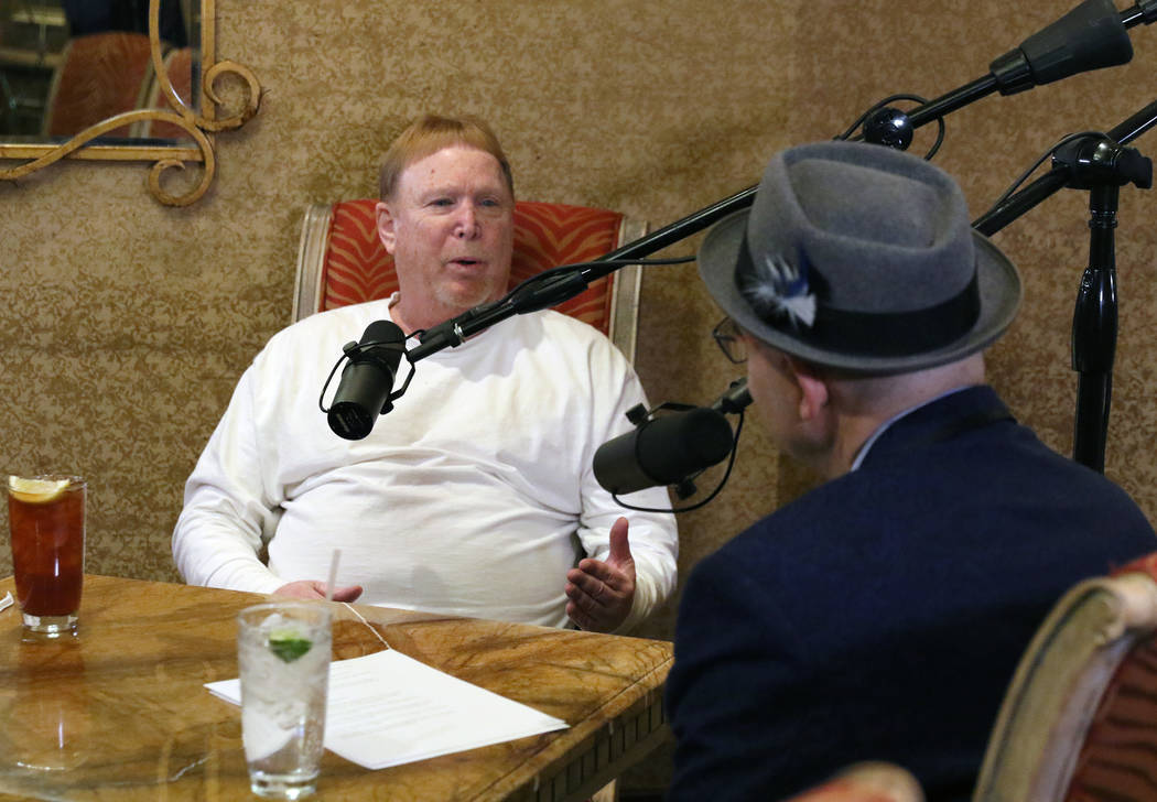 Las Vegas Raiders owner Mark Davis, left, speaks during his podcast with John Katsilometes on M ...