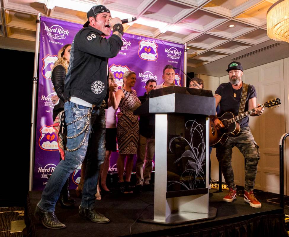 Bryan Hopkins, left, and Ben Carey of the band Elvis Monroe perform their song "The Fight& ...