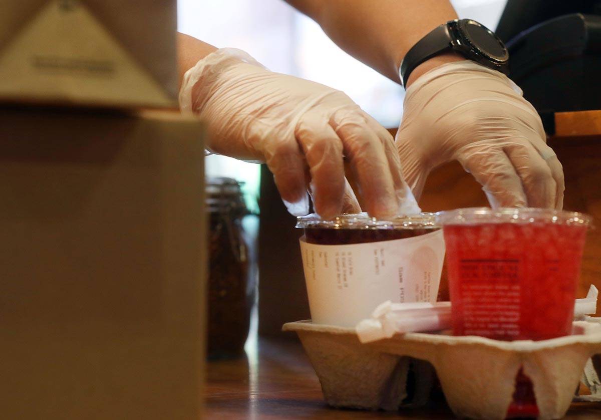 A Postmates pickup order is fulfilled at the Coffee Bean & Tea Leaf located on 6115 S Rainb ...