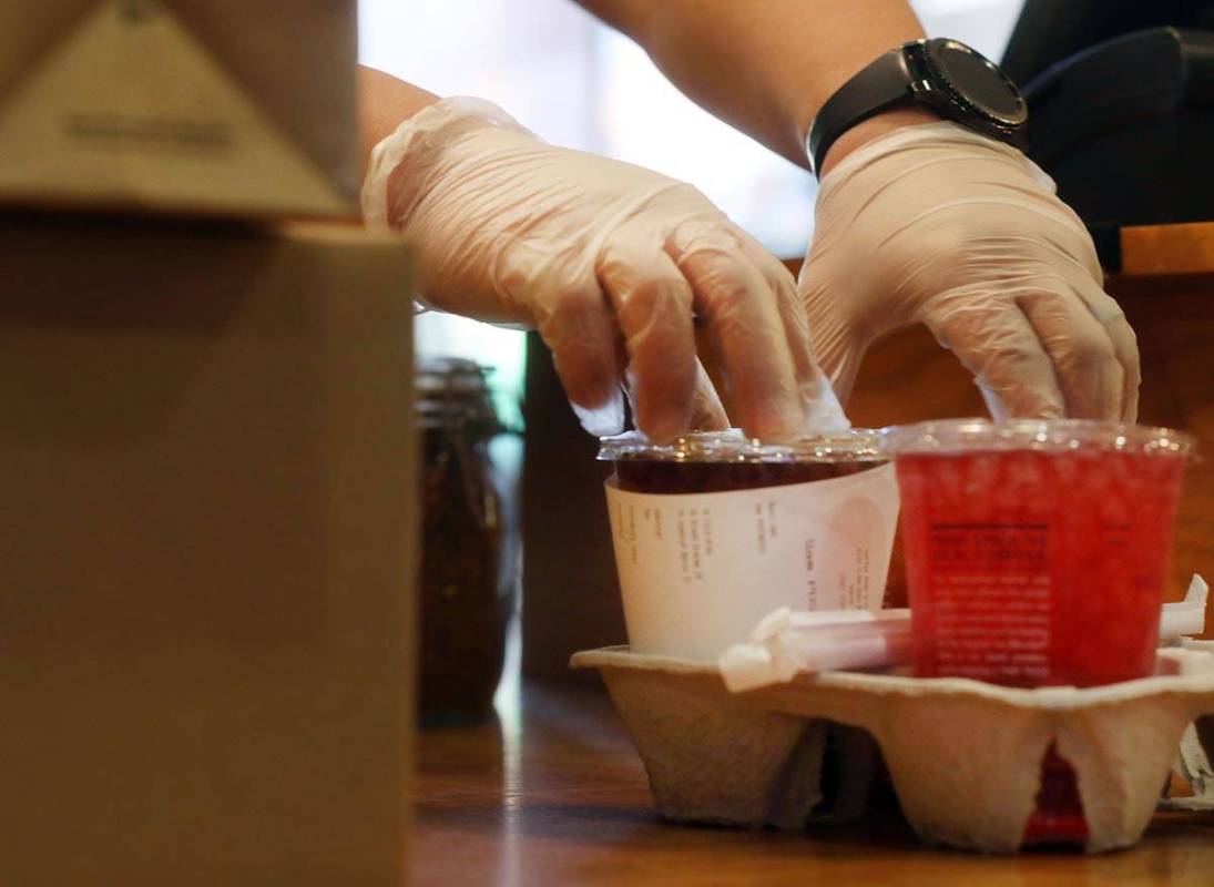 A Postmates pickup order is fulfilled at the Coffee Bean & Tea Leaf located on 6115 S Rainb ...