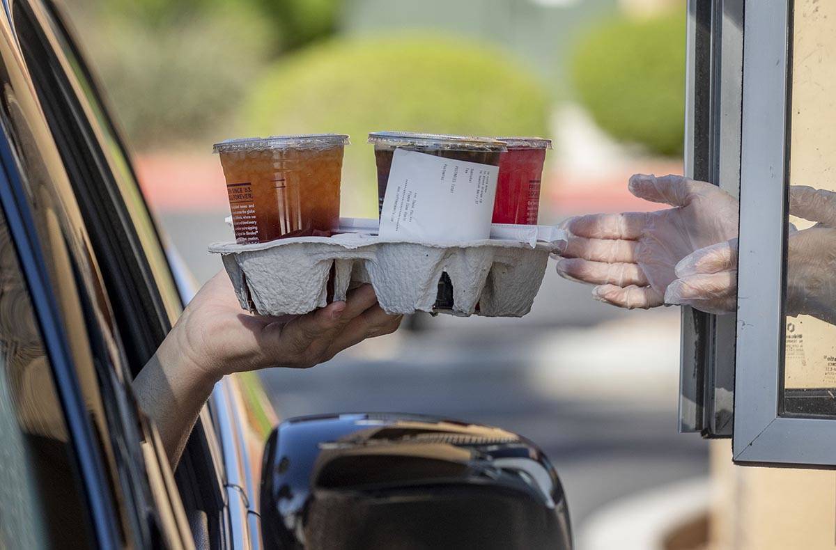 A Postmates pickup order is fulfilled at the Coffee Bean & Tea Leaf located on 6115 S Rainb ...