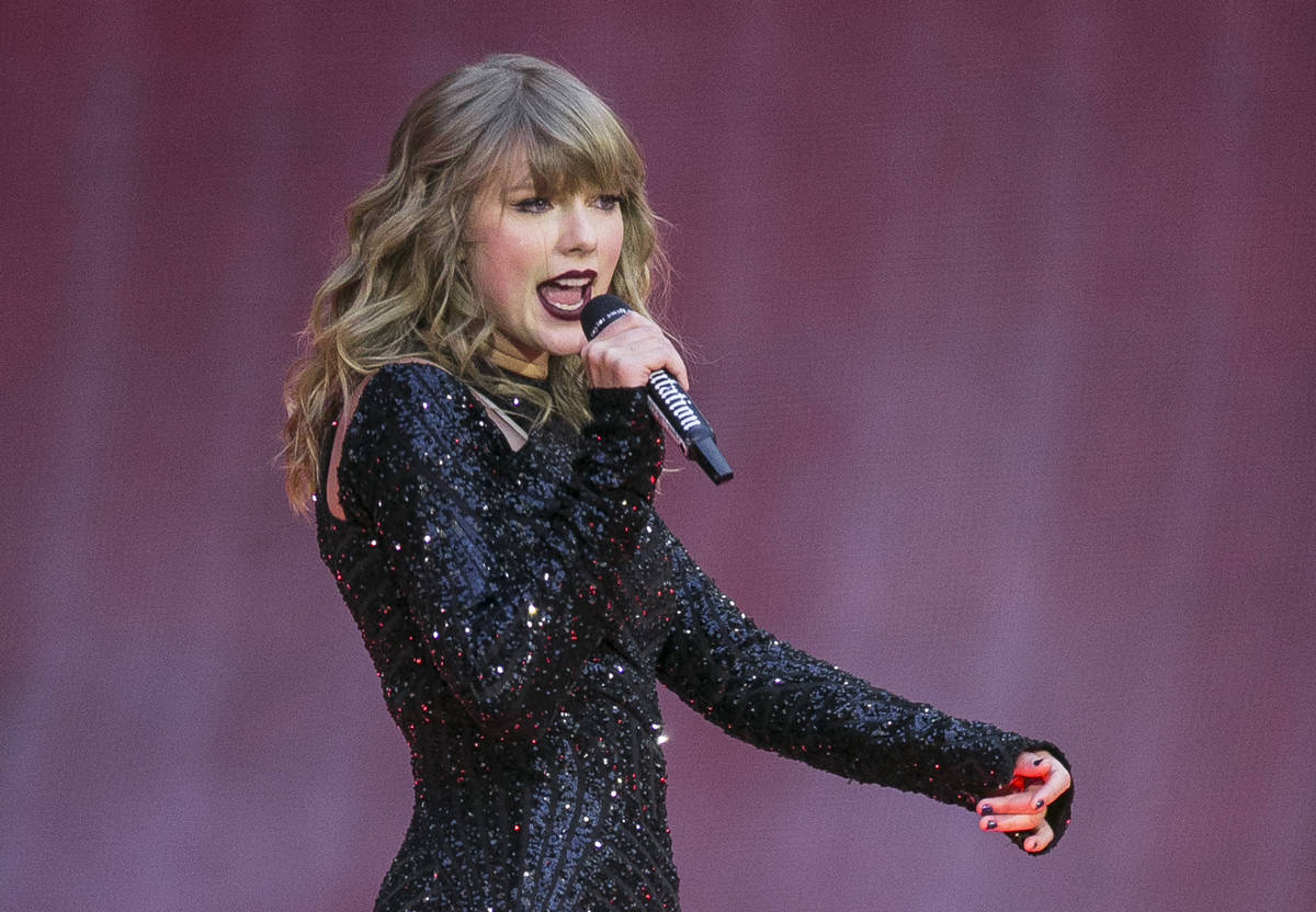 In this June 22, 2018, file photo, singer Taylor Swift performs on stage in concert at Wembley ...