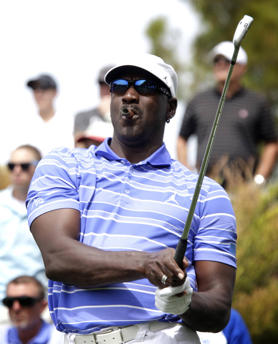 Michael Jordan tees off on the 5th hole at the Michael Jordan Celebrity Invitational at Shadow ...