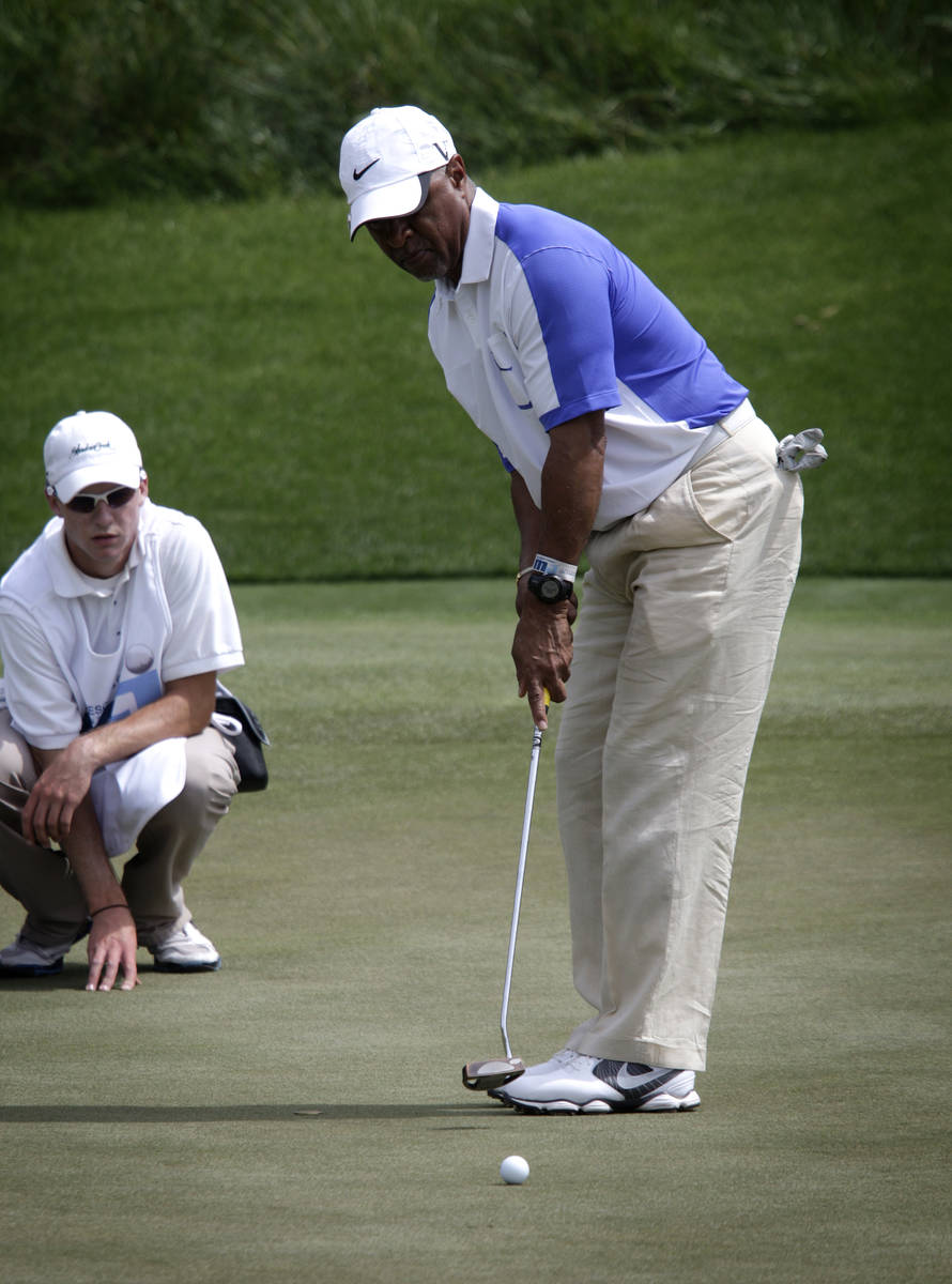 Ozzie Smith putts at the the Michael Jordan Celebrity Invitational at Shadow Creek Golf Course ...