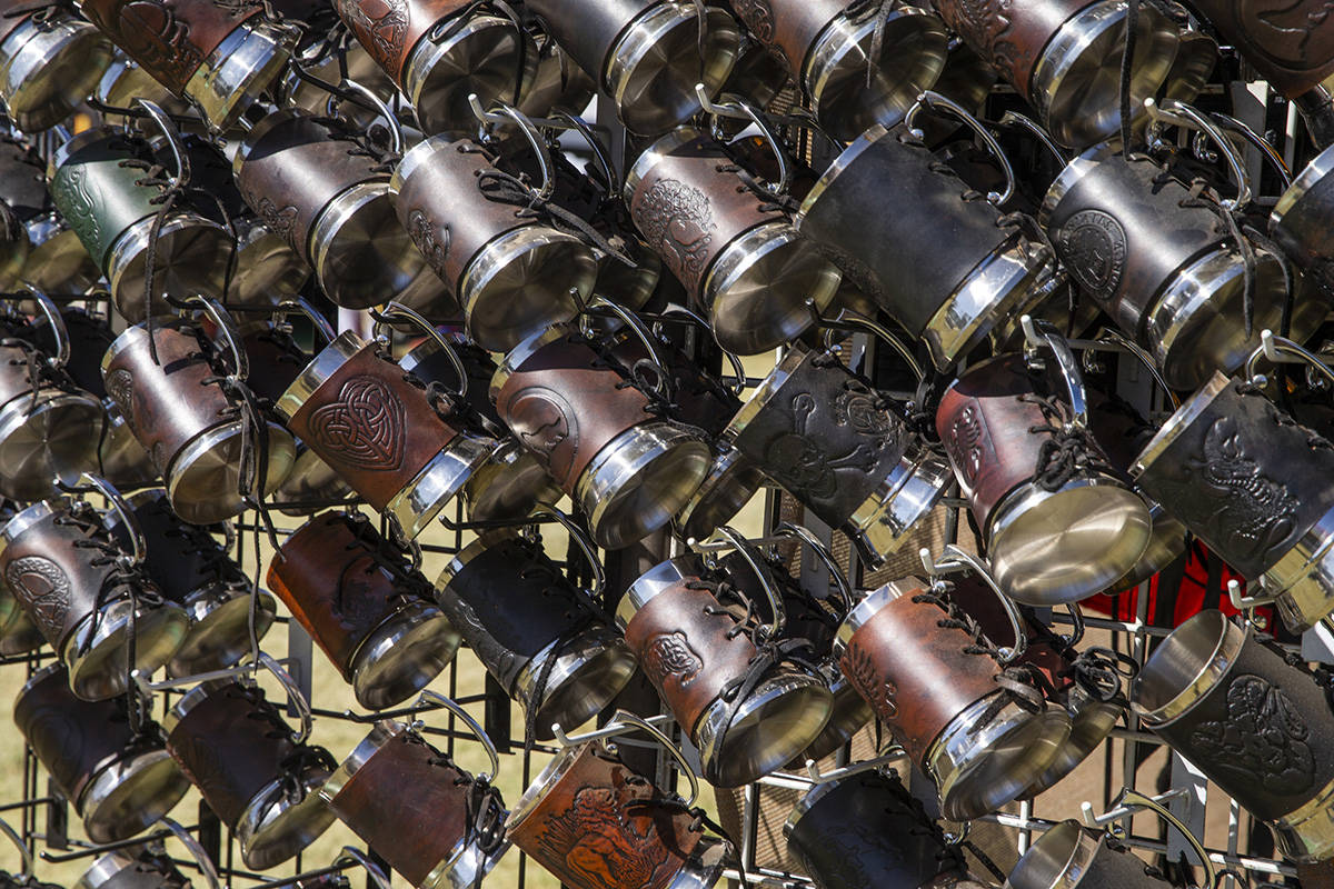 Mugs with leather skins are amongst the many items to be purchased during the Age of Chivalry R ...