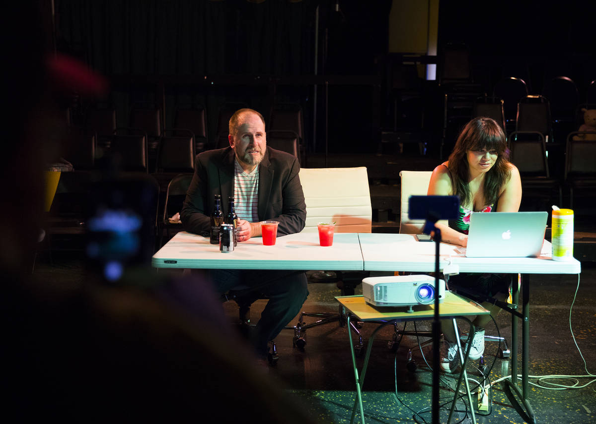 Troy Heard, founding artistic director of Majestic Repertory Theatre, left, talks with ensemble ...