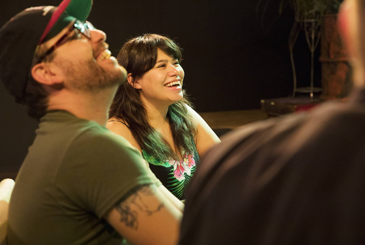 Ensemble members Mike Vargovich, left, and Natalie Senecal, center, talk with Troy Heard, found ...