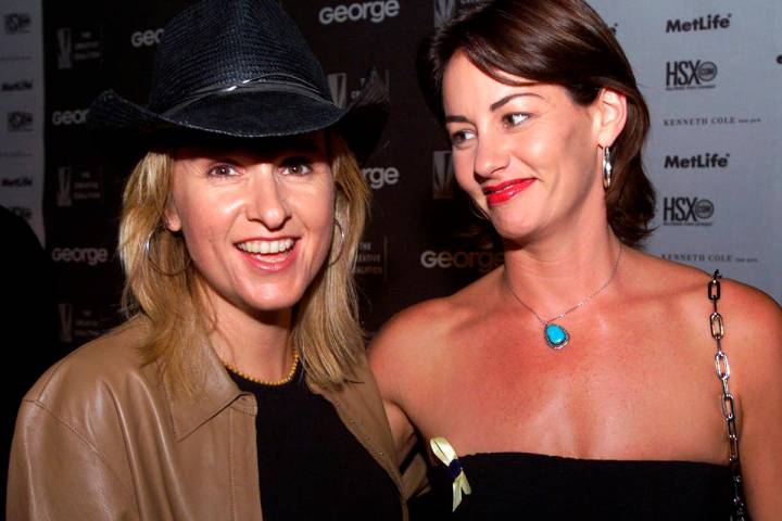 File - In this Aug. 16, 2000 file photo, Melissa Etheridge, left, and Julie Cypher arrive at a ...