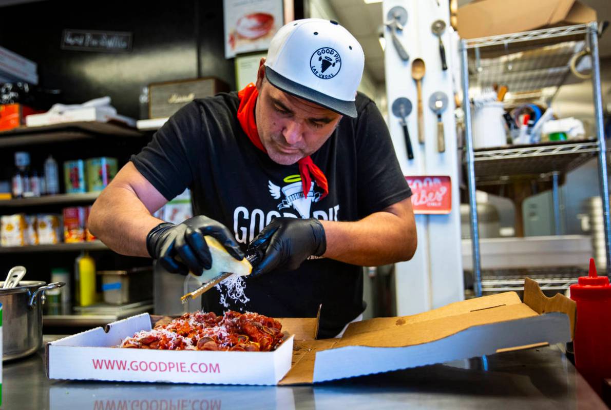 Vincent Rotolo, owner of Good Pie, prepares a triple pepperoni Detroit style pizza in downtown ...