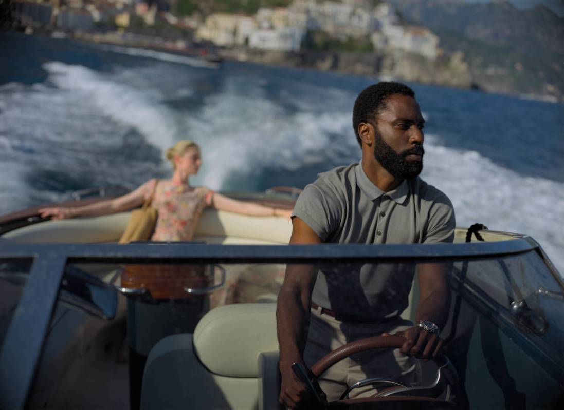 ELIZABETH DEBICKI and JOHN DAVID WASHINGTON star in "TENET." (Warner Bros. Entertainment)