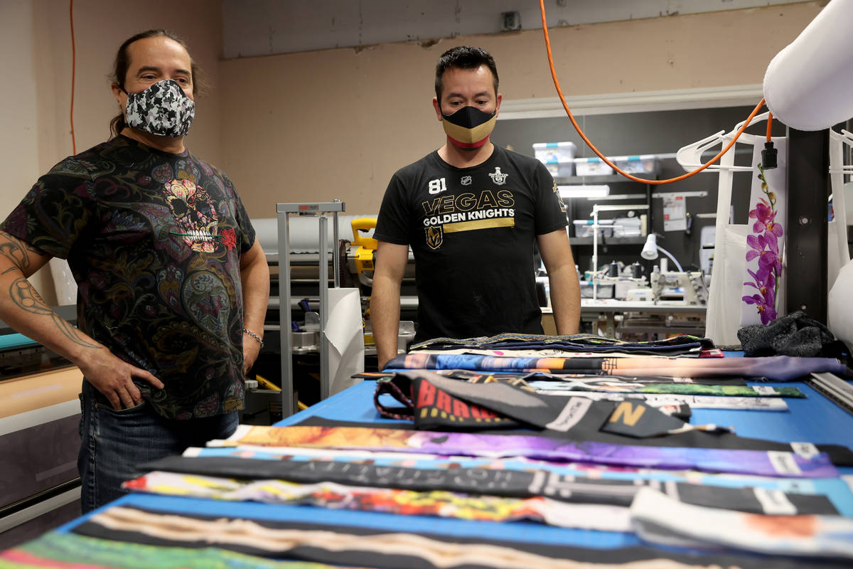 Glenn Adams, right, and former chef Jean Paul Labadie, co-owners of ApronTie, at their factory ...