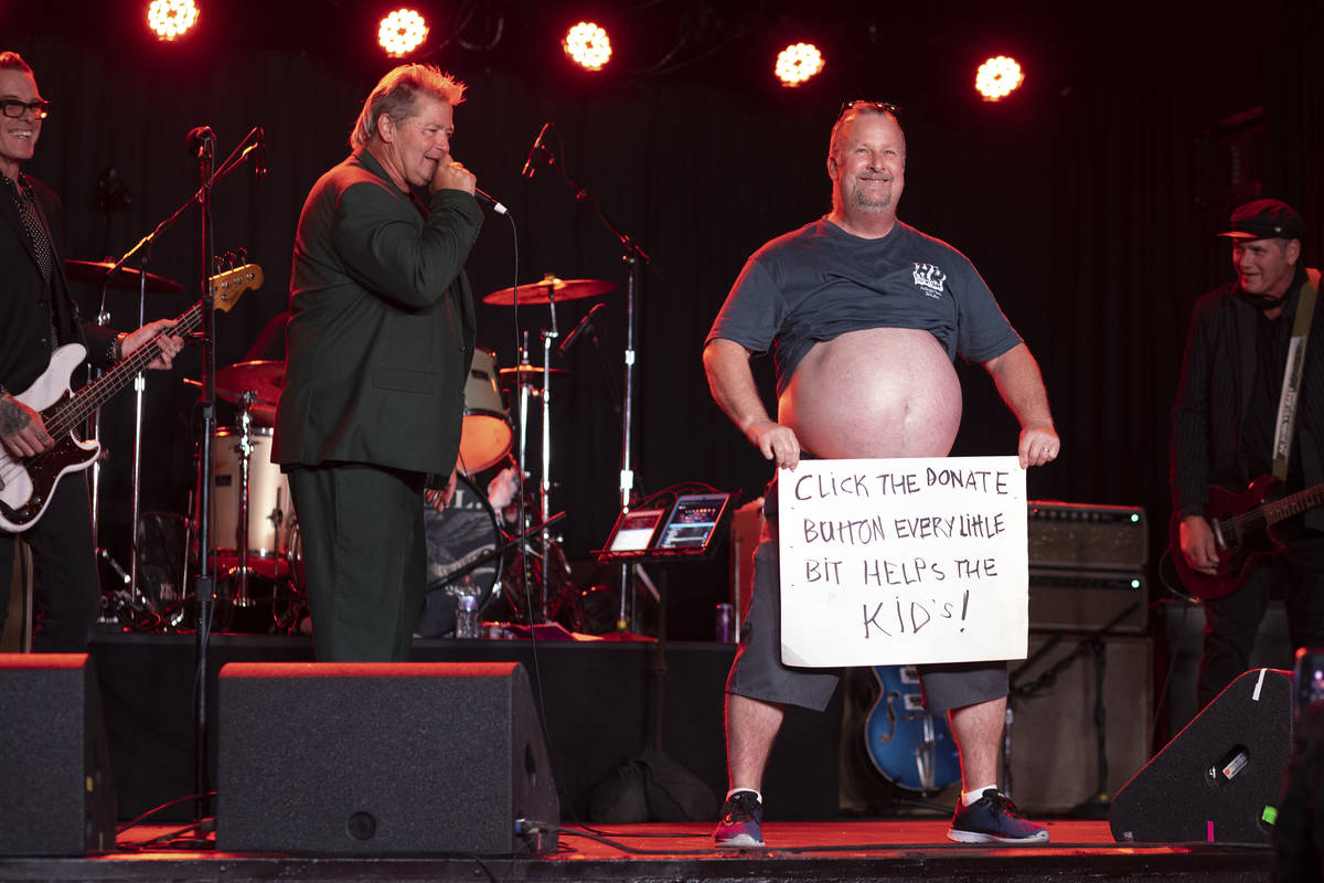 In the middle of T.S.O.L.'s performance, one crew member asks the audience to make donations &q ...