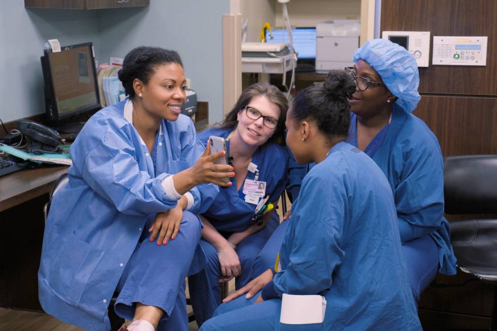 Dr. Amanda Little-Richardson, left, in an episode of the docuseries "Lenox Hill." (Netflix)