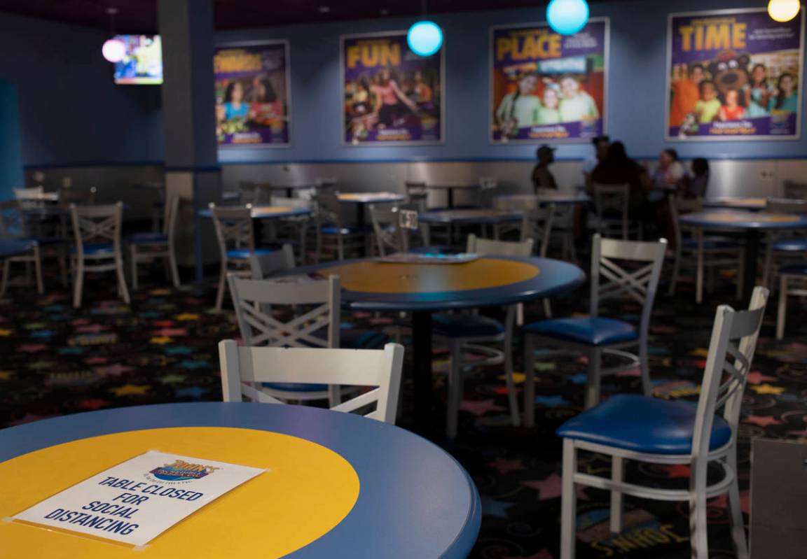 Tables are socially distanced at John's Incredible Pizza on Monday, June 15, 2020, in Las Vegas ...