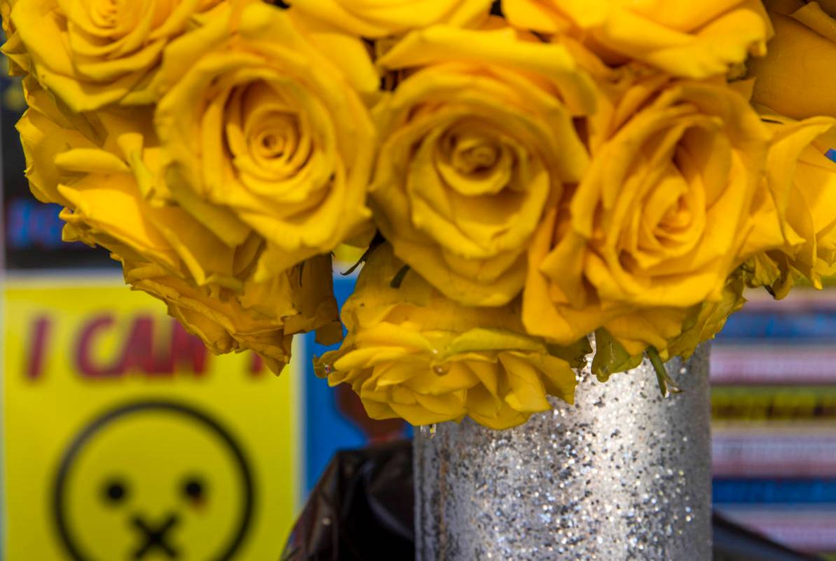 Real yellow roses in a bleeding heart shape drip water as the experiential company Good All Day ...