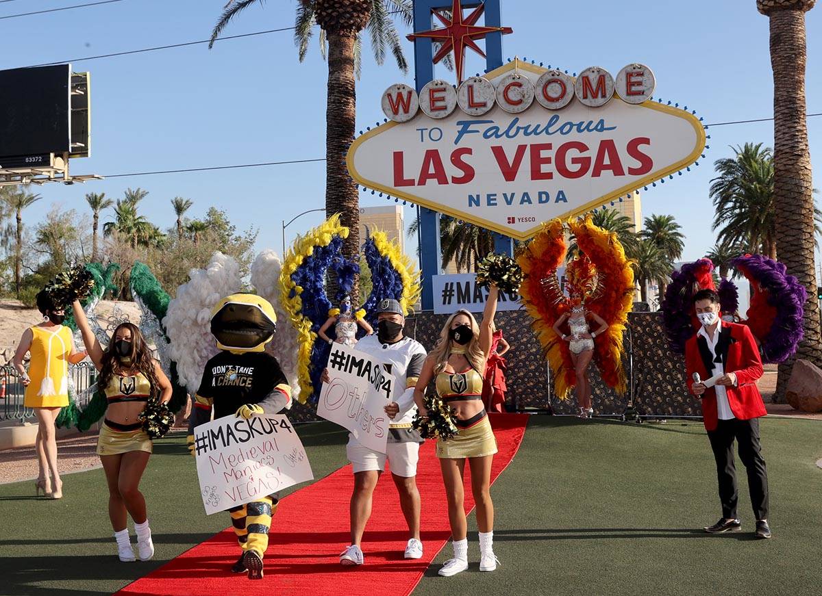 Vegas Golden Knights mascot, Chance, Anthem singer Carnell "Golden Pipes" Johnson and ...