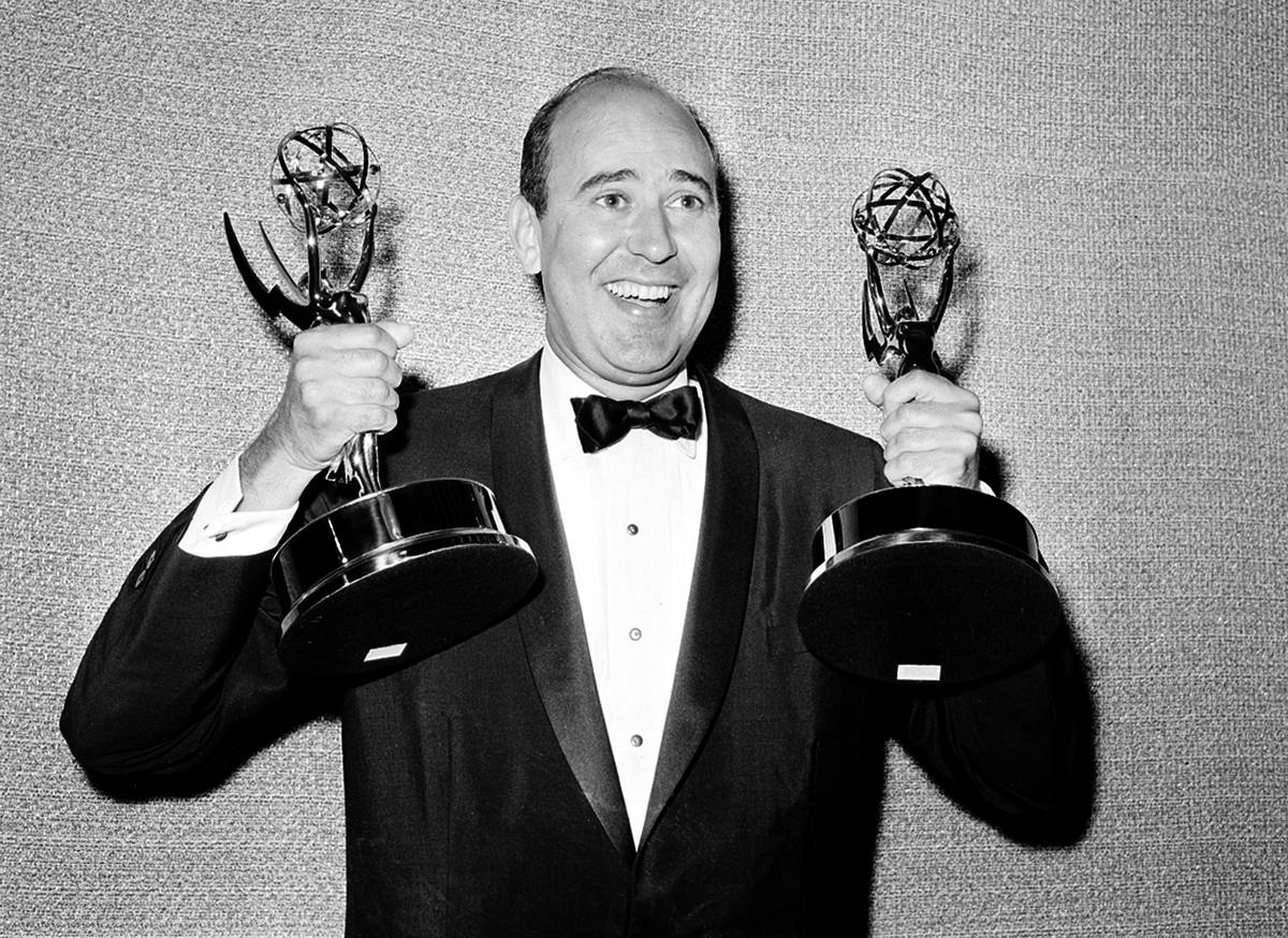 In this May 26, 1963 file photo, Carl Reiner shows holds two Emmy statuettes presented to him a ...