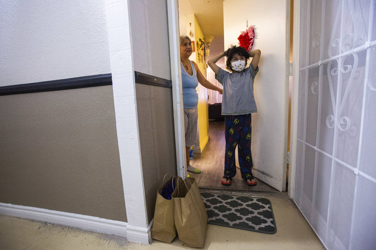 Aiden Pina, 9, talks about his favorite meals from Delivering With Dignity in Las Vegas on Frid ...