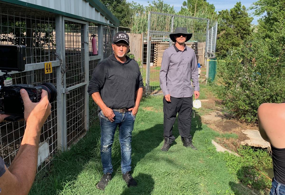 Jeff Lowe, left and Zak Bagans are shown at Greater Wynnewood Exotic Animal Park on Friday, Jul ...