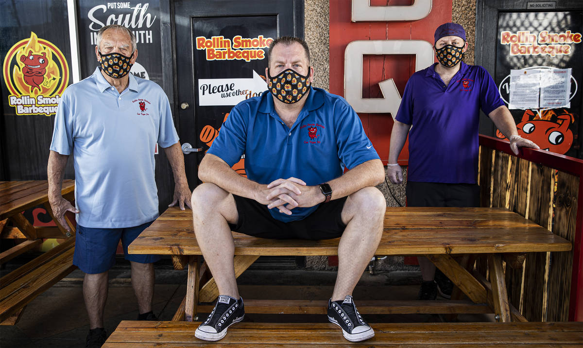 Owners Lee Holland, John Holland and Dusty Ardoin at Rollin' Smoke BBQ on Wednesday, July 15, 2 ...