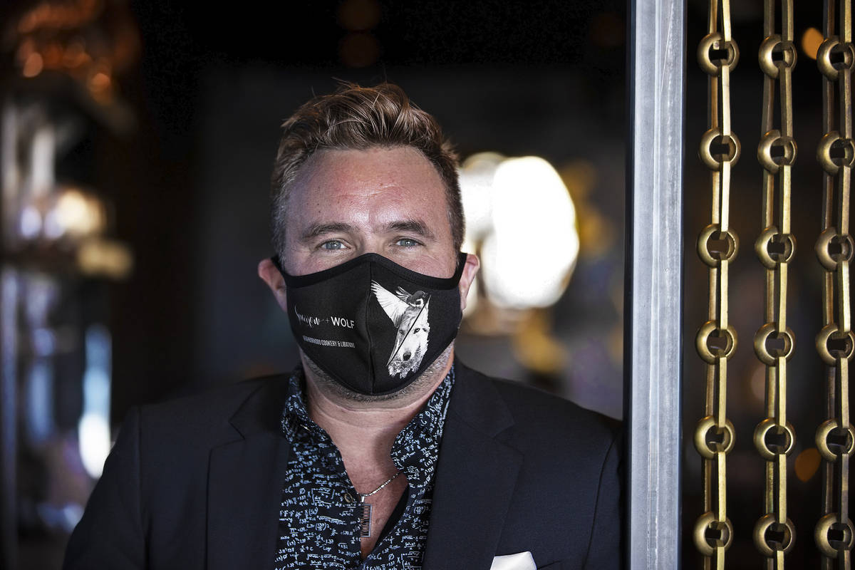 Business partner John Anthony wears a custom face mask at Sparrow + Wolf on Tuesday, July 14, 2 ...