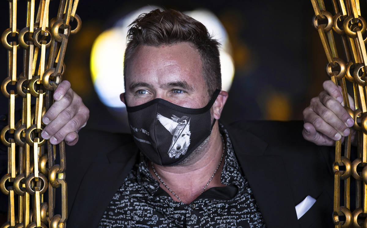 Business partner John Anthony wears a custom face mask at Sparrow + Wolf on Tuesday, July 14, 2 ...
