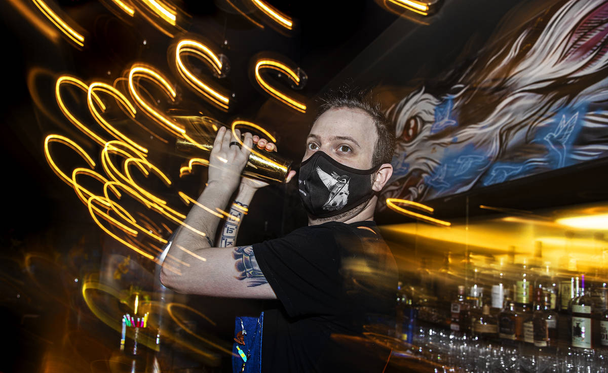 Bartender Ilan Miller makes a cocktail at Sparrow + Wolf on Tuesday, July 14, 2020, in Las Vega ...