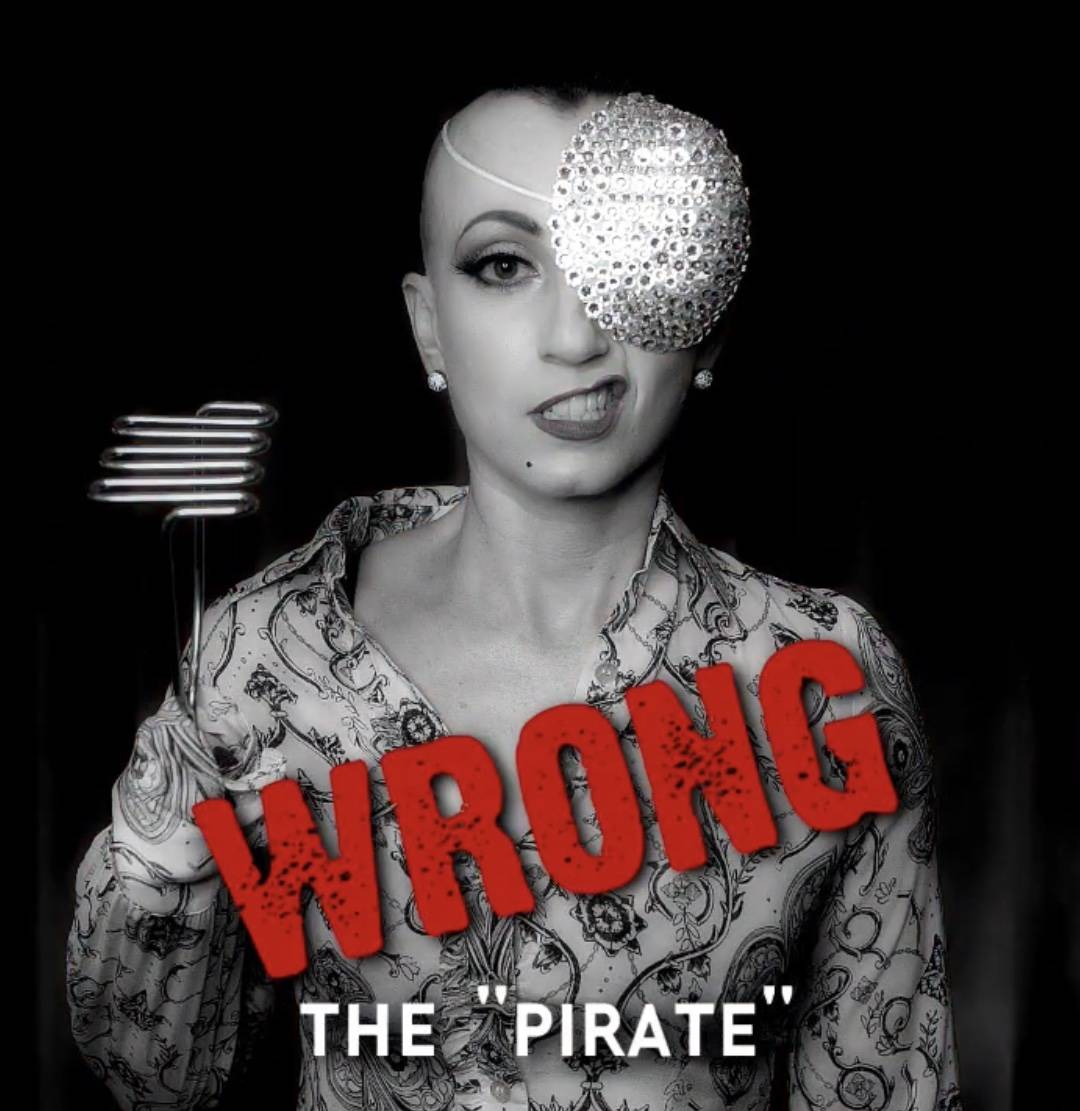 Burlesque queen Michelle L'Amour shows how not to wear a face mask in a video she posted on her ...