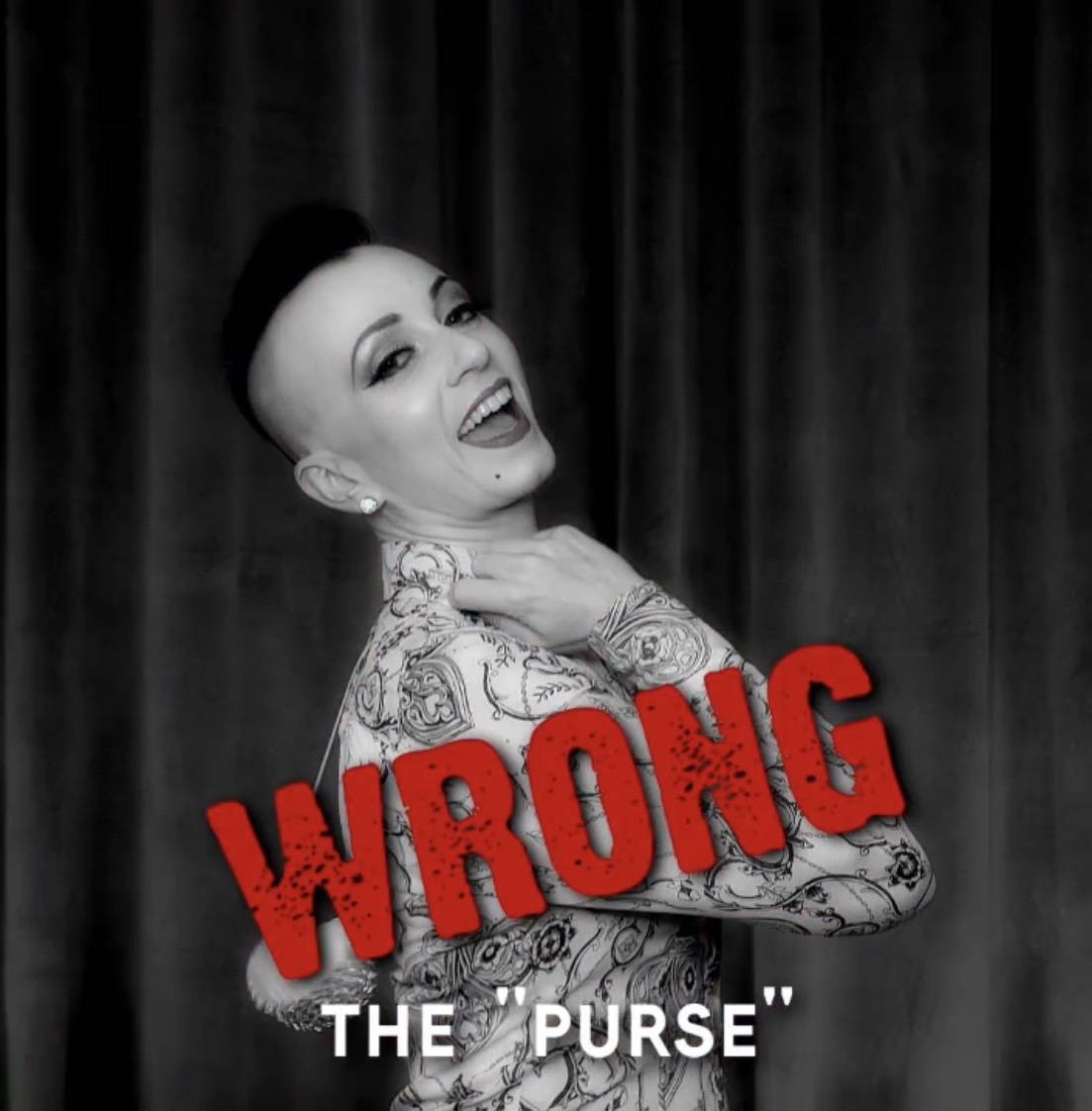 Burlesque queen Michelle L'Amour shows how not to wear a face mask in a video she posted on her ...