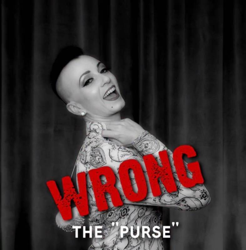 Burlesque queen Michelle L'Amour shows how not to wear a face mask in a video she posted on her ...