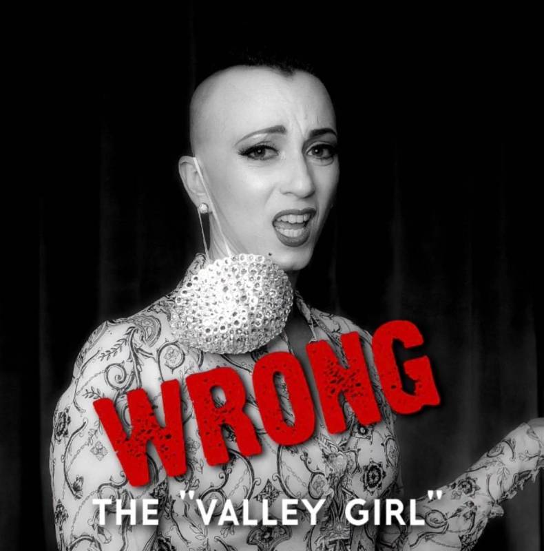 Burlesque queen Michelle L'Amour shows how not to wear a face mask in a video she posted on her ...