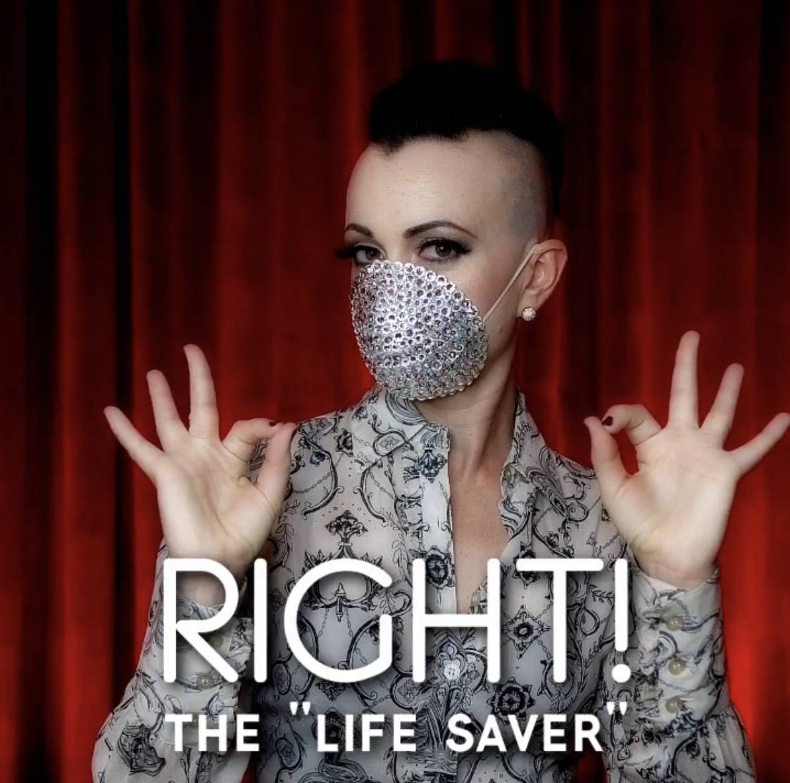 Burlesque queen Michelle L'Amour shows the right way to wear a face mask in a video she posted ...