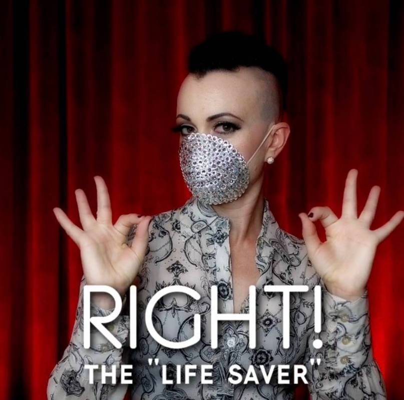 Burlesque queen Michelle L'Amour shows the right way to wear a face mask in a video she posted ...