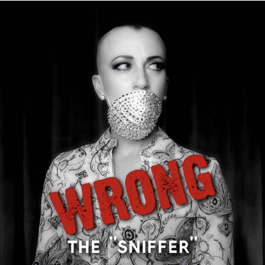 Burlesque queen Michelle L'Amour shows how not to wear a face mask in a video she posted on her ...