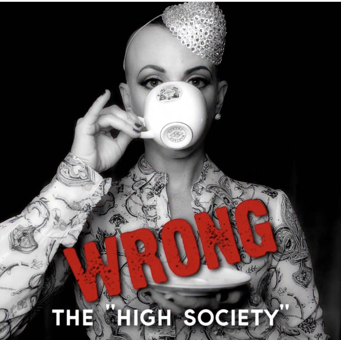 Burlesque queen Michelle L'Amour shows how not to wear a face mask in a video she posted on her ...