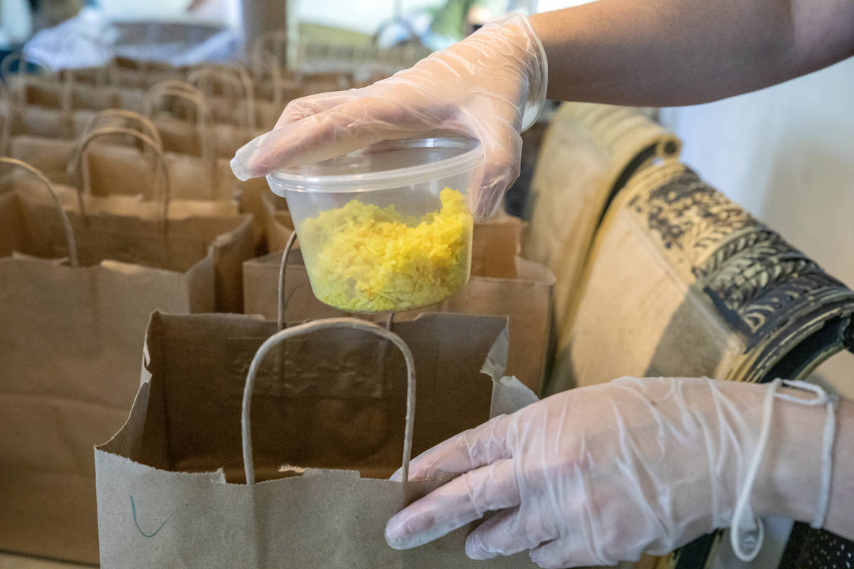 Please Send Noodles volunteer Amanda Jorda packages meals to be given out to the community from ...
