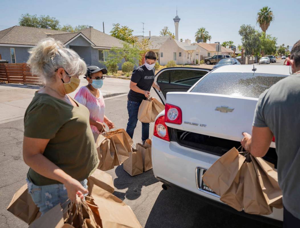 Please Send Noodles book club volunteers aid Foster Kinship in picking up 50 meals from Kim Fos ...