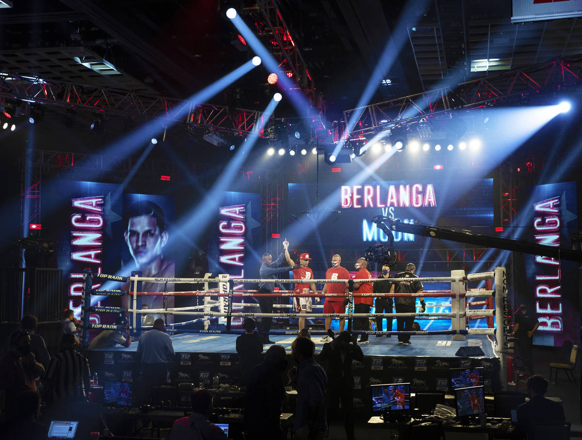 Edgar Berlanga celebrates with his team after knocking out Eric Moon during their super middlew ...