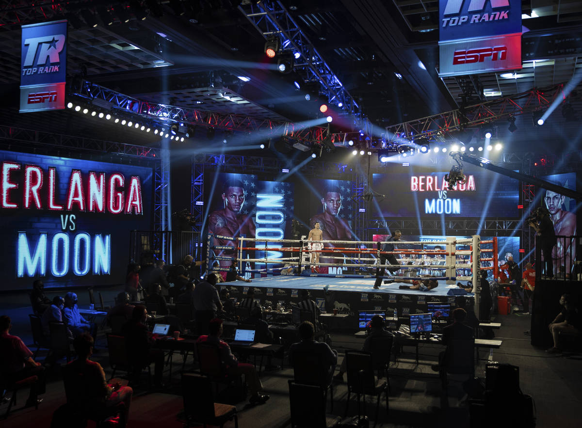 Edgar Berlanga, top/left, leaps in the air after knocking out Eric Moon during their super midd ...