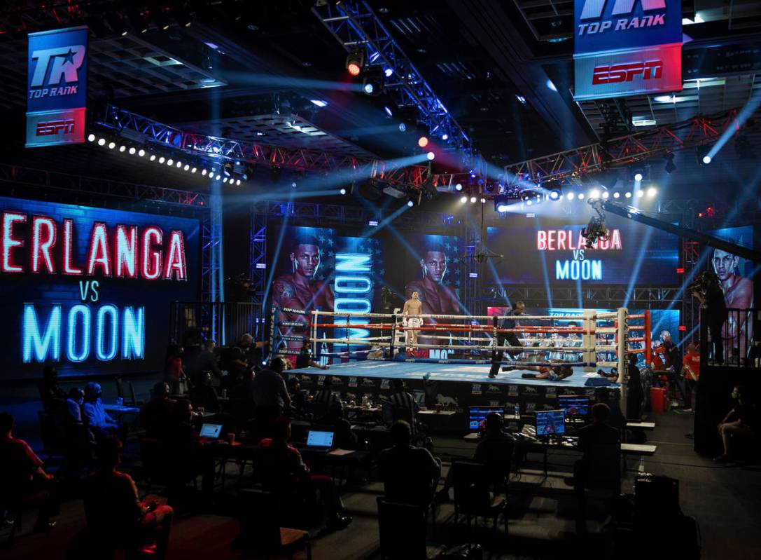 Edgar Berlanga, top/left, leaps in the air after knocking out Eric Moon during their super midd ...