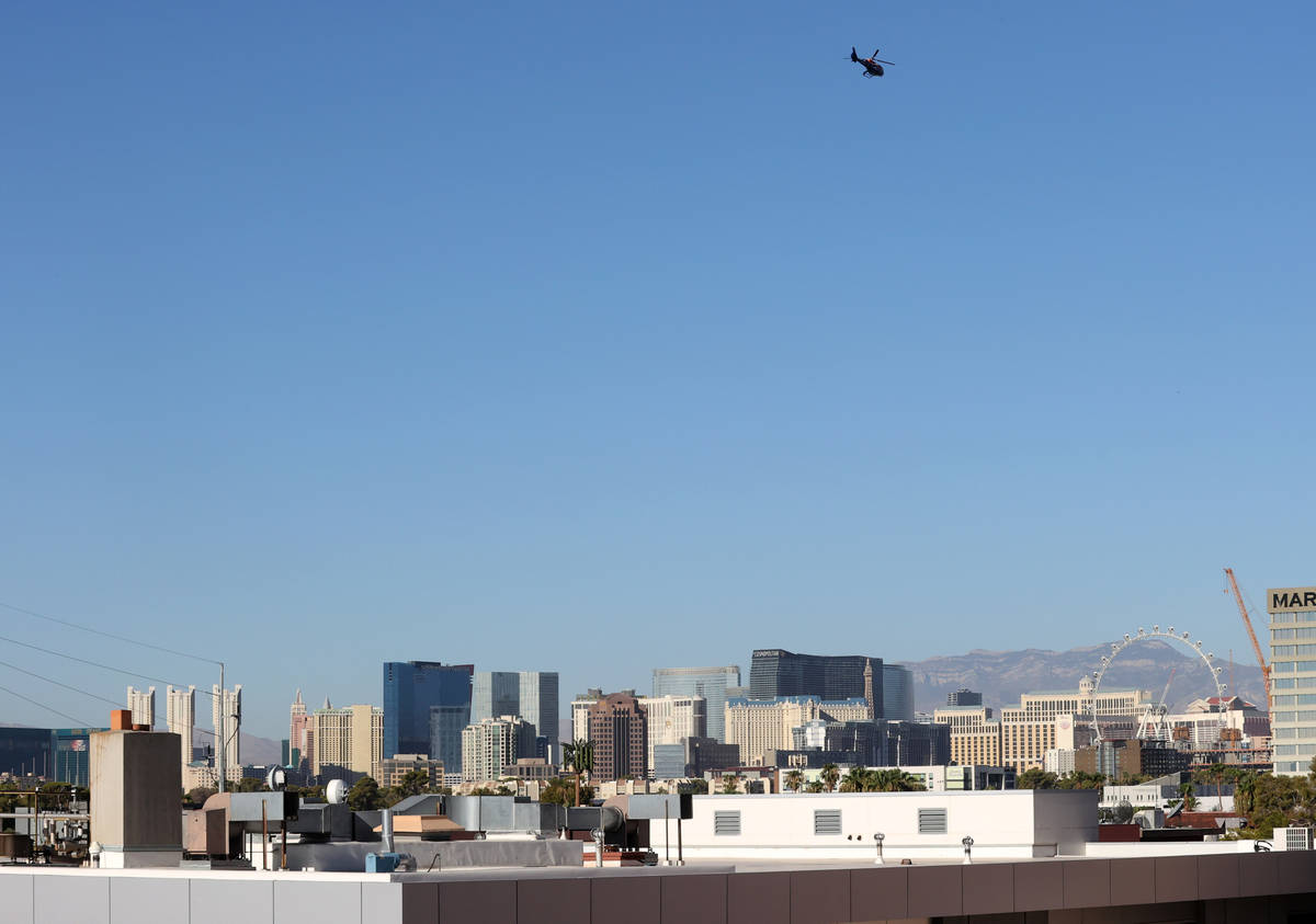 Las Vegas Review-Journal columnist John Katsilometes and Piff the Magic Dragon fly in a helicop ...