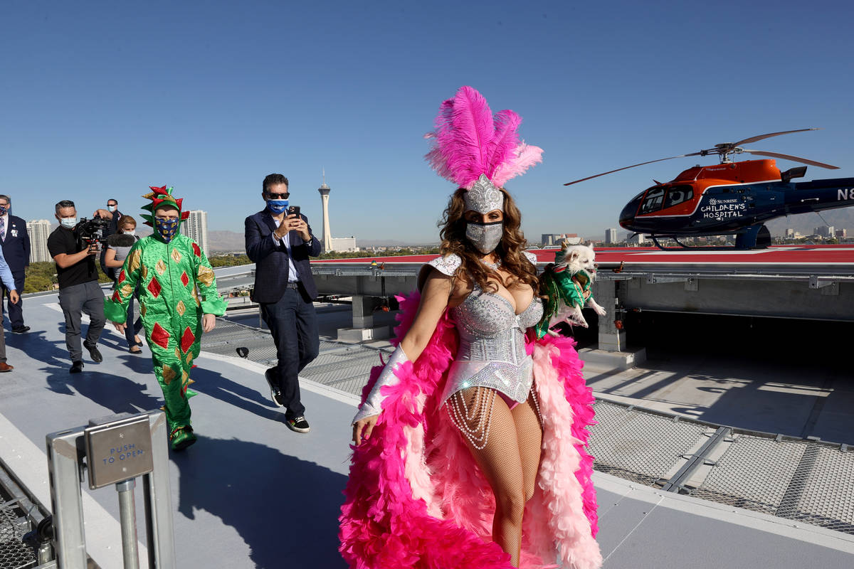 Jade Simone, Mr Piffles, Las Vegas Review-Journal columnist John Katsilometes and Piff the Magi ...